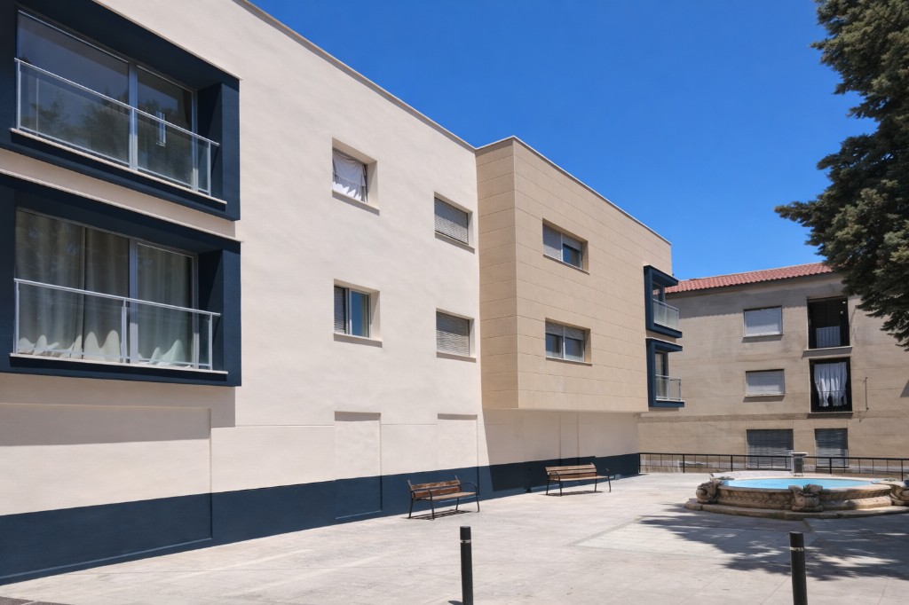 Proyecto pintura exterior - Edificio crema y azul